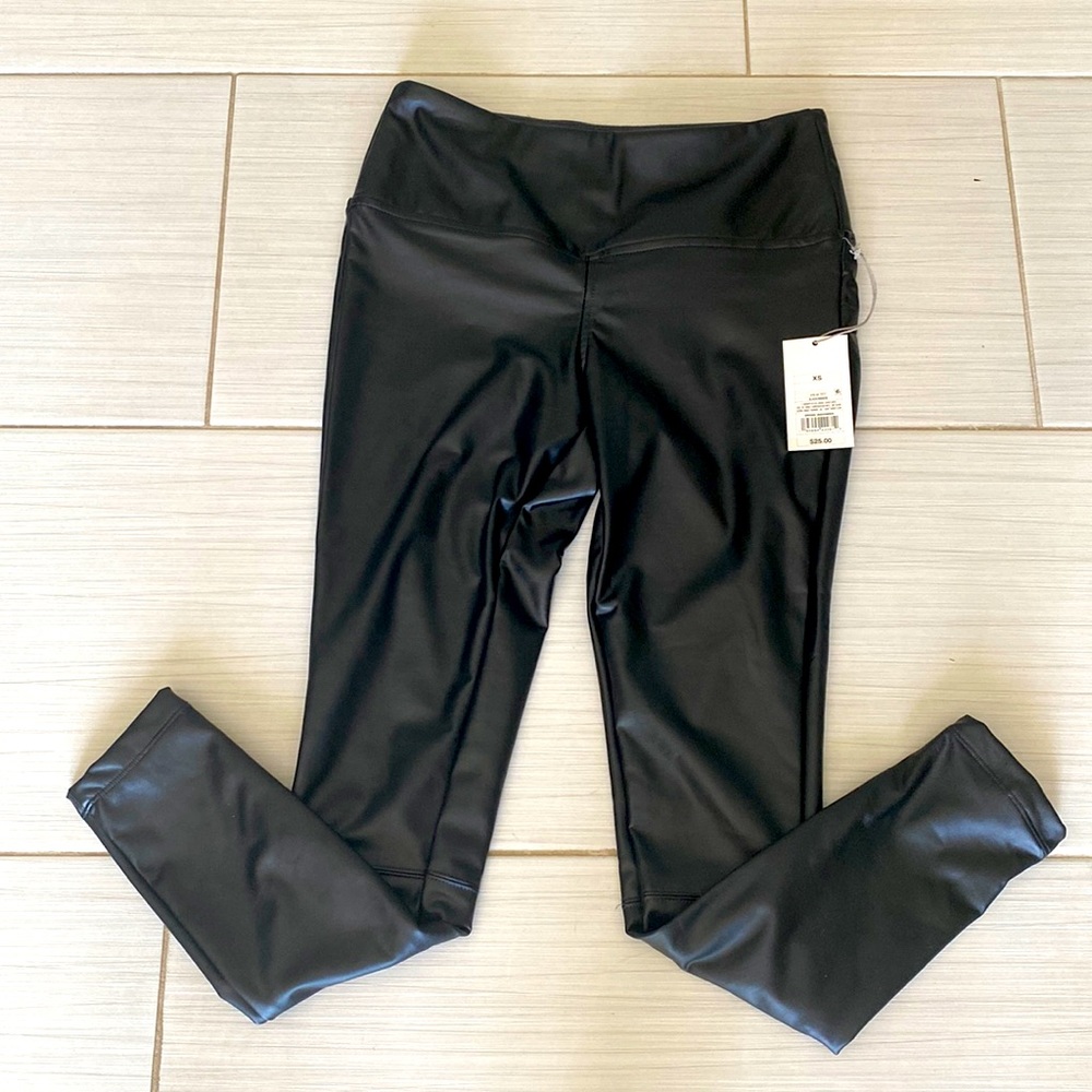 NWT faux leather pants.